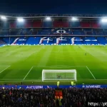 프랑스 리그앙 명문 축구 클럽 - A dynamic and vibrant scene inside the Parc des Princes stadium during a high-stakes Ligue 1 match, ...